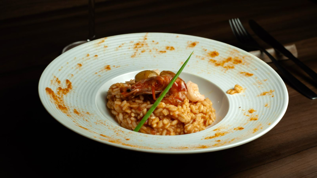 Risoto de camarão flambado com uvas verdes